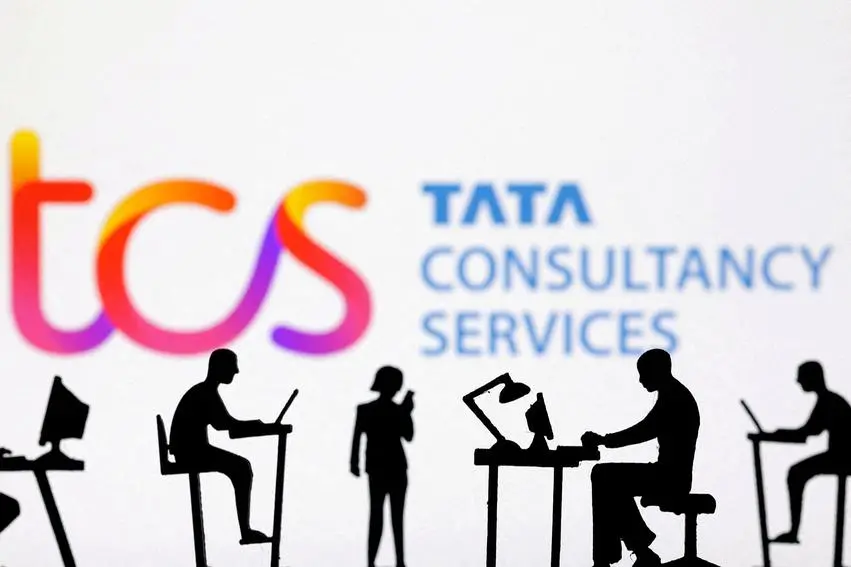 FILE PHOTO: FILE PHOTO: Figurines with computers and smartphones are seen in front of TCS: Tata Consultancy Services logo in this illustration taken, February 19, 2024. REUTERS/Dado Ruvic/Illustration/File Photo/File Photo , Reuters/REUTERS