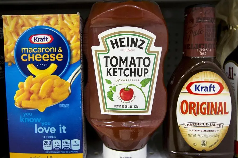 FILE PHOTO: A Heinz Ketchup bottle sits between a box of Kraft macaroni and cheese and a bottle of Kraft Original Barbecue Sauce on a grocery store shelf in New York March 25, 2015. REUTERS/Brendan McDermid/File Photo , Reuters Images/REUTERS