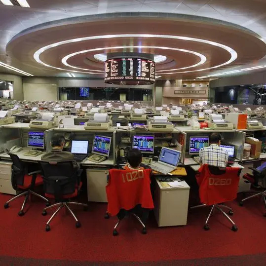 Hong Kong stocks edge up on property gains; China shares seesaw