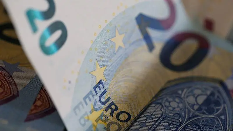 Euro tumbles, investors ramp up ECB rate cut bets after weak PMIs