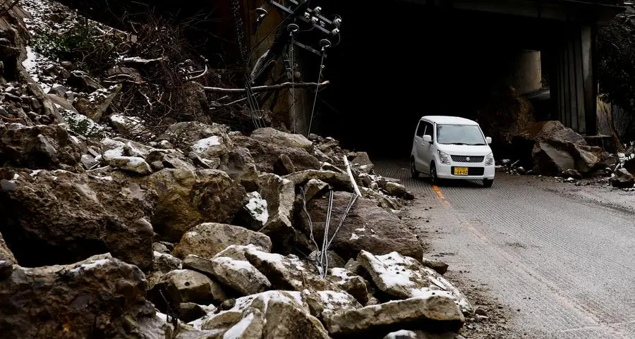 Japan premier vows \"ceaseless\" aid as snow hampers quake relief
