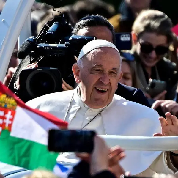 Don't shut door on foreigners, migrants, Pope Francis says in Hungary