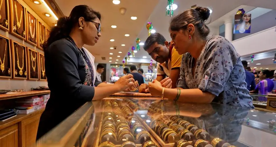 Gold gleams on rate cut hopes after inflation data, en route quarterly gain