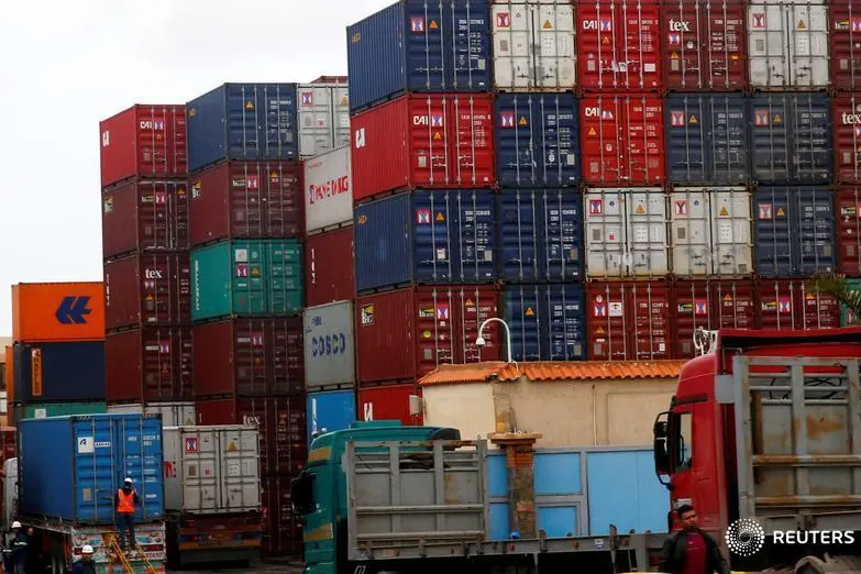Container trucks stand in line on the road due to bad weather in the Mediterranean city of Alexandria, March 30, 2019. REUTERS/Amr Abdallah Dalsh