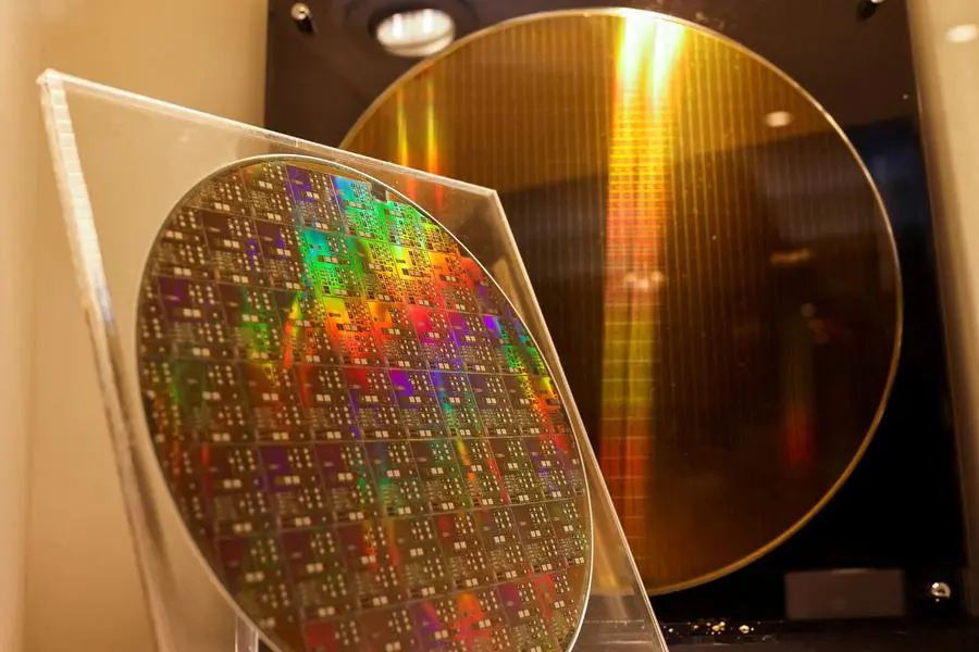 FILE PHOTO: Two chips are on display at the Taiwan Semiconductor Research Institute (TSRI) in Hsinchu, Taiwan, February 11, 2022. . REUTERS/Ann Wang/File Photo , REUTERS