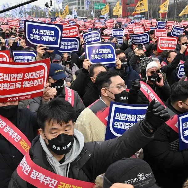 Thousands of South Korean doctors rally as healthcare standoff escalates