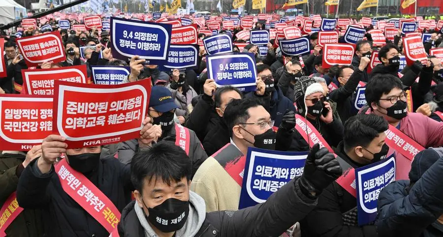 Thousands of South Korean doctors rally as healthcare standoff escalates