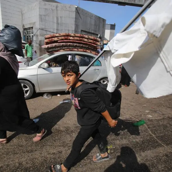Gazans raise white flags to flee Israeli onslaught on foot