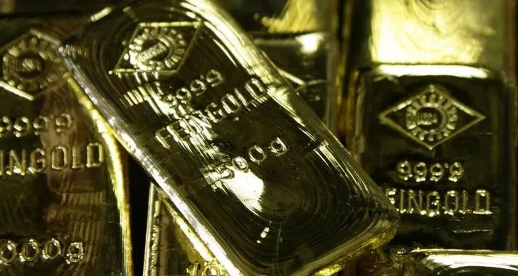 Gold flat as investors eye Powell's speech