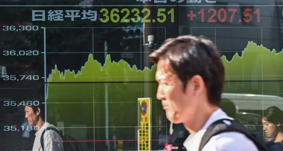 Most Asian markets rise as traders gear up for Fed rate cut