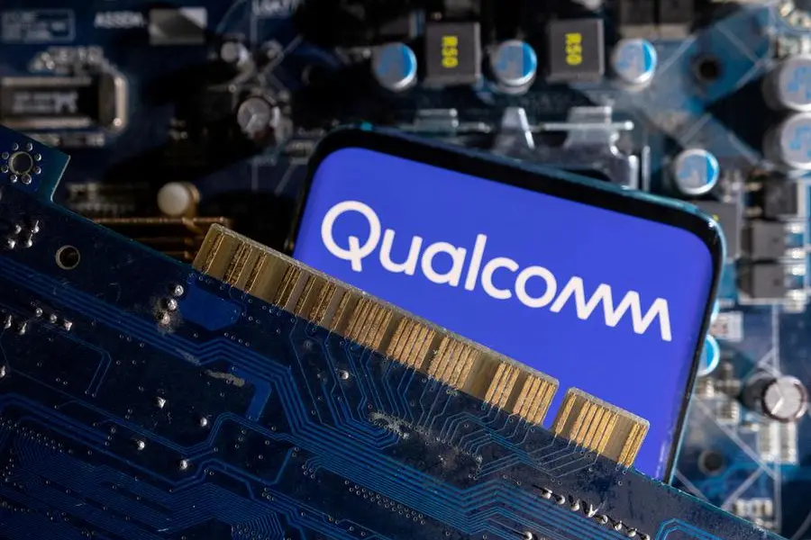 FILE PHOTO: A smartphone with a displayed Qualcomm logo is placed on a computer motherboard in this illustration taken March 6, 2023. REUTERS/Dado Ruvic/Illustration/File Photo , REUTERS