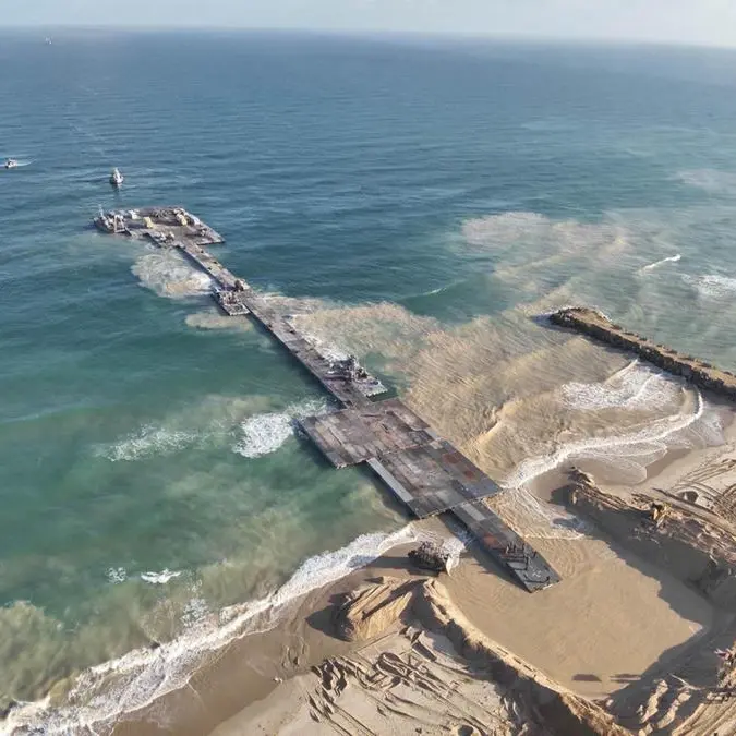 Aid begins to arrive in Gaza via US-built pier