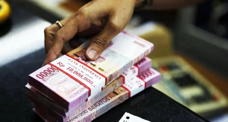 Indonesian rupiah hits 4-year low on resilient dollar