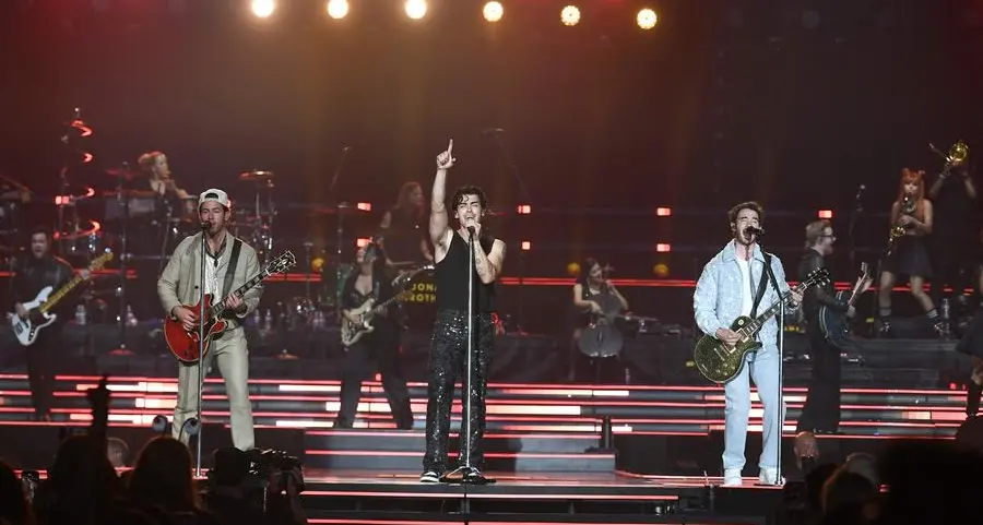 Nick Jonas asks fan to stop throwing things during Jonas Brothers concert in California