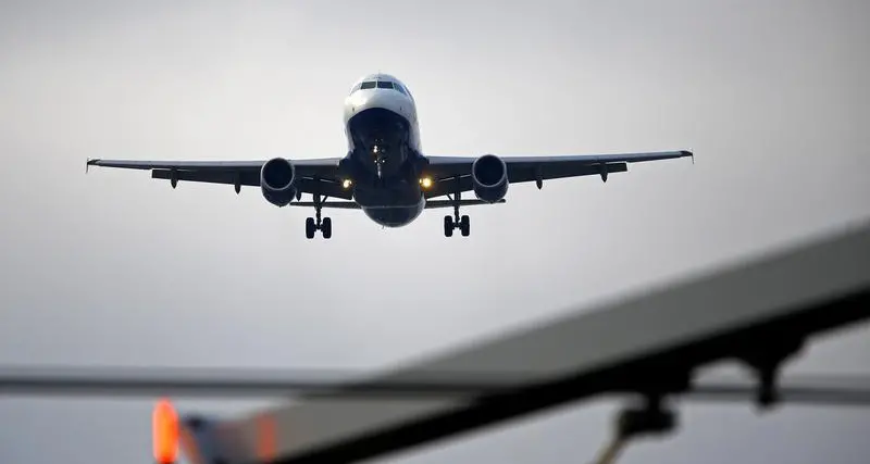 Hong Kong airport runway re-opens after damaged cargo plane delayed flights