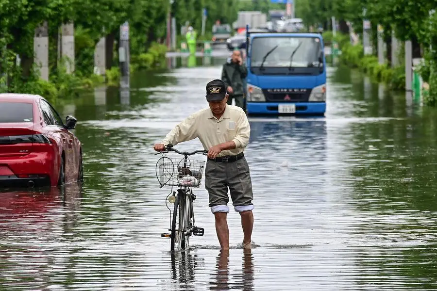 One dead, two missing in Japan after heavy rain
