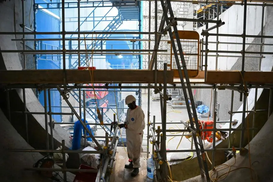 <p>Photo used for illustrative purpose only. An workman wearing PPE works at the Thames Tideway tunnel building site, in west London, on June 14, 2023.</p>\\n , Agence France-Presse (AFP)/AFP