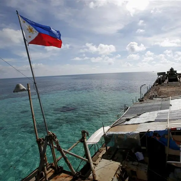 China says it saw armed Philippine personnel on vessel in disputed South China Sea