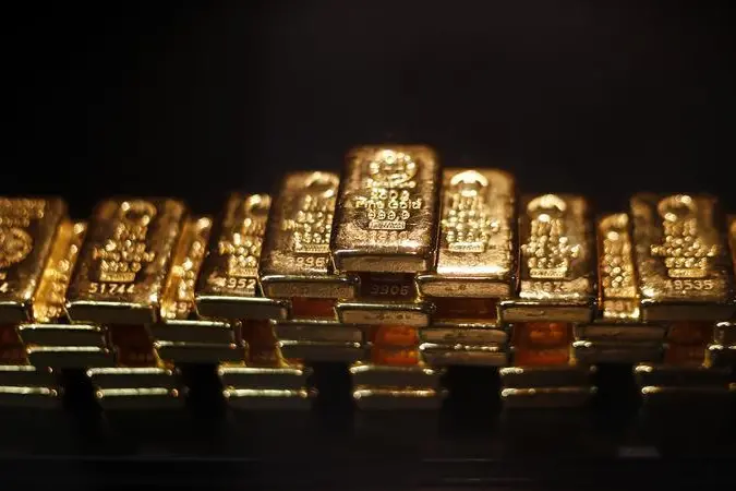Gold firms ahead of US inflation data, but set for weekly loss
