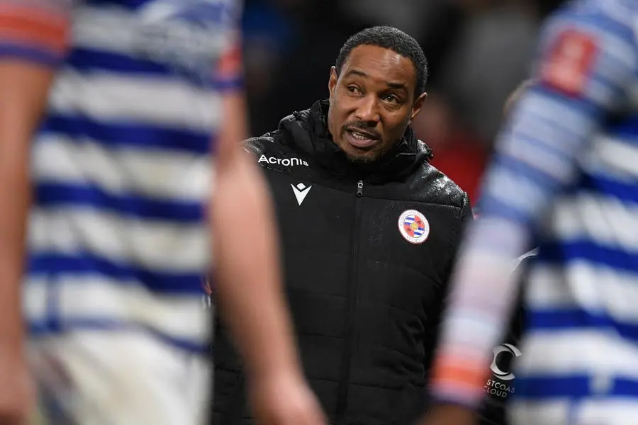 Reading\\'s English manager Paul Ince leaves at half-time during the English FA Cup fourth round football match between Manchester United and Reading at Old Trafford in Manchester, north west England, on January 28, 2023. (Photo by Oli SCARFF / AFP)