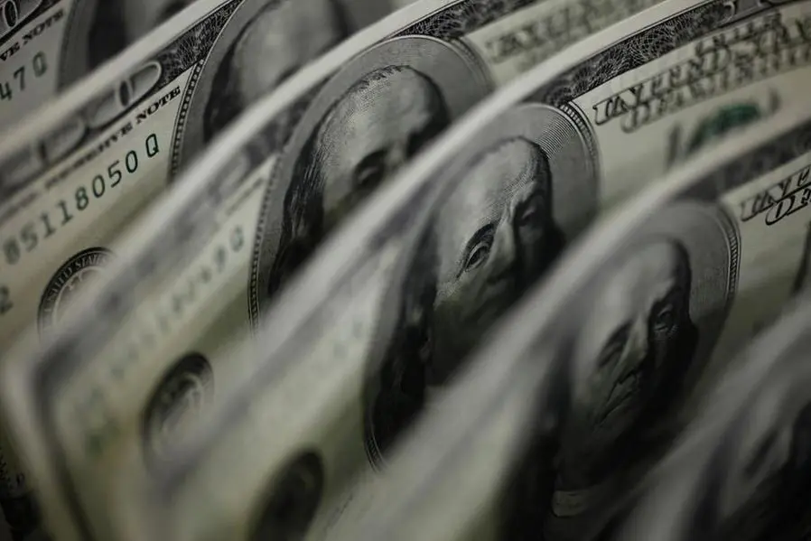 Dollar steadies ahead of Fed minutes, pound shrugs off record surplus