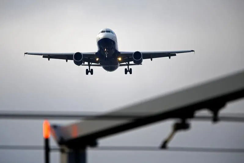 Image used for illustrative purpose. An airplane prepares to land at an airport. , Pierre Albouy 