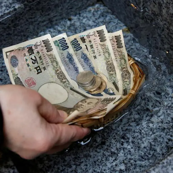 Yen dives as BOJ plays down chance of hikes, soothing markets