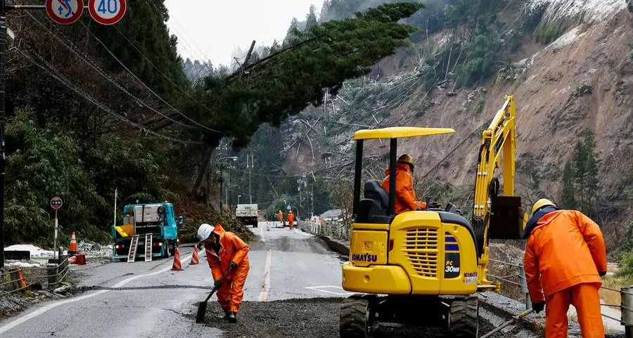 Japan quake survivors, without power or water, seek news on rebuild plans