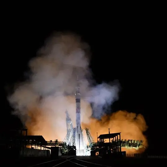 Two Russians, American reach space station