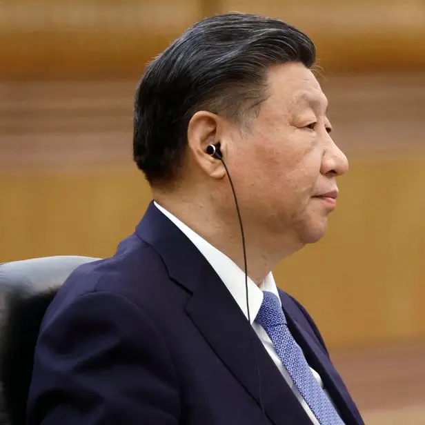 China's Xi tells ex-Taiwan leader 'external interference' cannot block unification