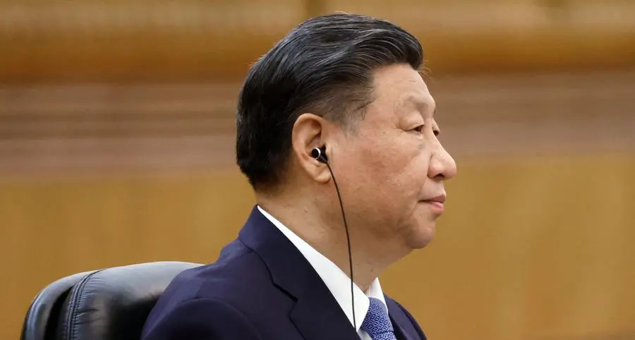 China's Xi tells ex-Taiwan leader 'external interference' cannot block unification