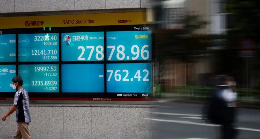 Japan's chip stocks lift Nikkei to seventh straight weekly gain