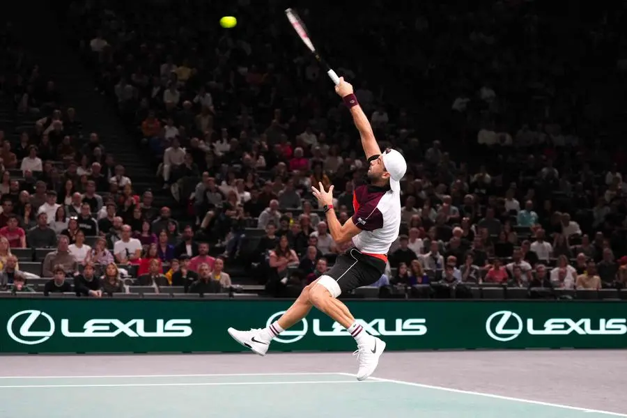 Bulgaria\\'s Grigor Dimitrov hits an overhead smash to Kazakhstan\\'s Alexander Bublik during their men\\'s singles match on day four of the Paris ATP Masters 1000 tennis tournament at the Accor Arena - Palais Omnisports de Paris-Bercy - in Paris on November 2, 2023. (Photo by Dimitar DILKOFF / AFP) , Agence France-Presse (AFP)/AFP