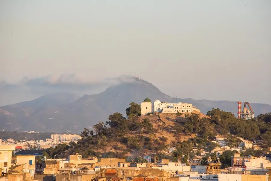High angle view of the rooftops, hill and skyline of the medina of Tunis, Tunisia, at sunset with Atlas Mountains in the background. Getty Images Image used for illustrative purpose. , Getty Images
