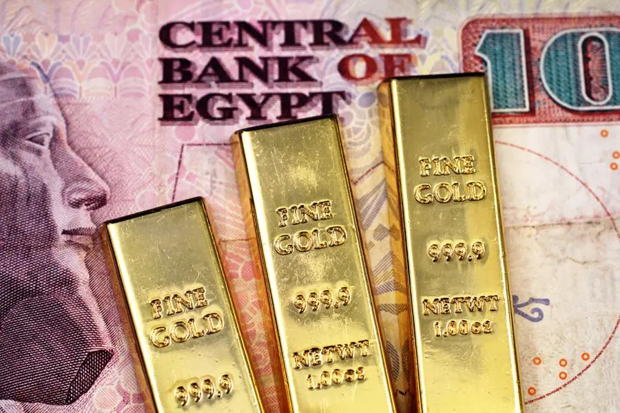 A close up image of three small gold bars on a ten Egyptian pound bank note in macro. Getty Images Image used for illustrative purpose , Getty Images/iStockphoto
