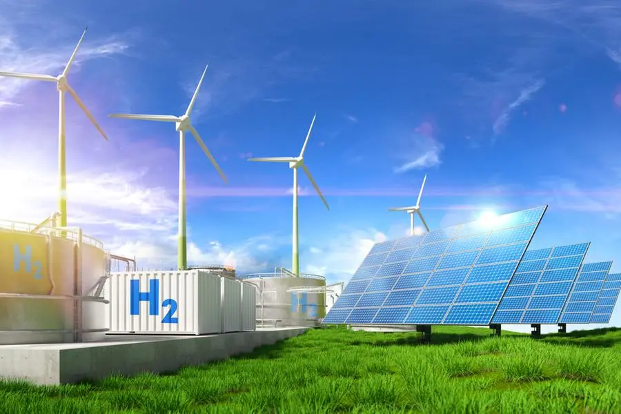Digital generated image of wind turbines, solar panels and Hydrogen containers standing on landscape against blue sky. Getty Images Image used for illustrative purpose. , Getty Images