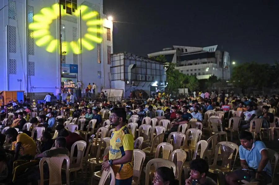 Chennai Super Kings' fans wait for the start of the Indian Premier League (IPL) Twenty20 final cricket match between Gujarat Titans and Chennai Super Kings after the match got delayed due to rain, at an open air theatre for live streaming of the match, in Chennai on May 28, 2023. (Photo by R. Satish BABU / AFP)