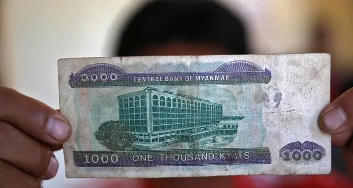 Myanmar households crippled as currency tumbles to record low