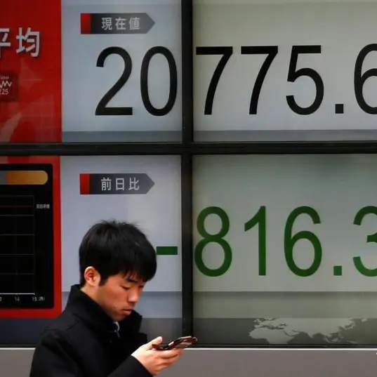 Japan's Nikkei slips from record high as chip stocks lose ground