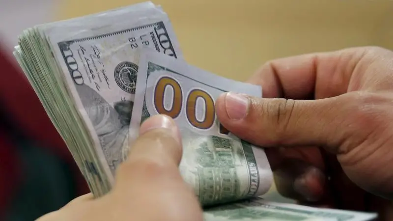 Dollar drifts, Asian stocks mixed as markets brace for Jackson Hole