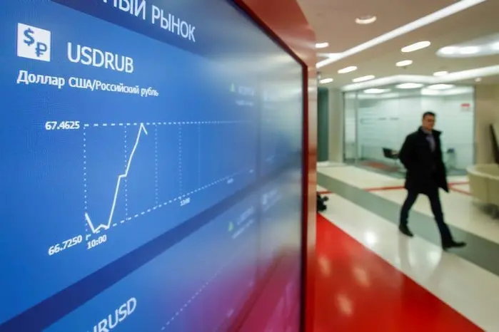 A man walks past an information screen inside the office of the Moscow Exchange in Moscow, Russia February 28, 2020. Maxim Shemetov, Reuters , Reuters Images