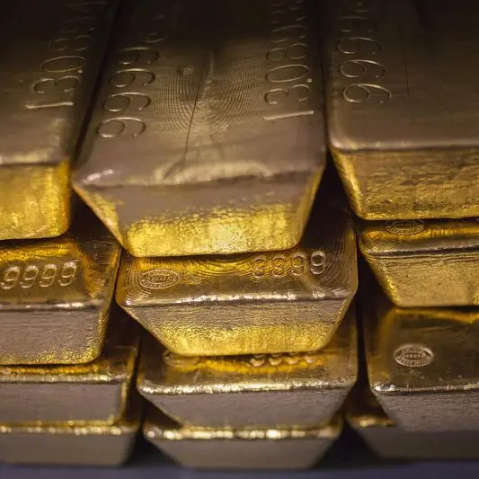 Gold rises on dollar weakness, US Fed meeting in focus