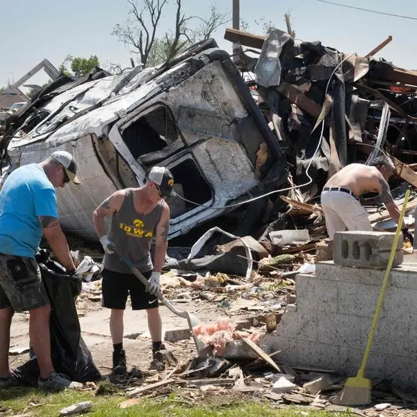 At least 14 dead in US tornadoes, storms