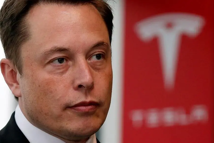 Tesla Motors Inc Chief Executive Elon Musk pauses during a news conference in Tokyo September 8, 2014. , Reuters Images/Toru Hanai