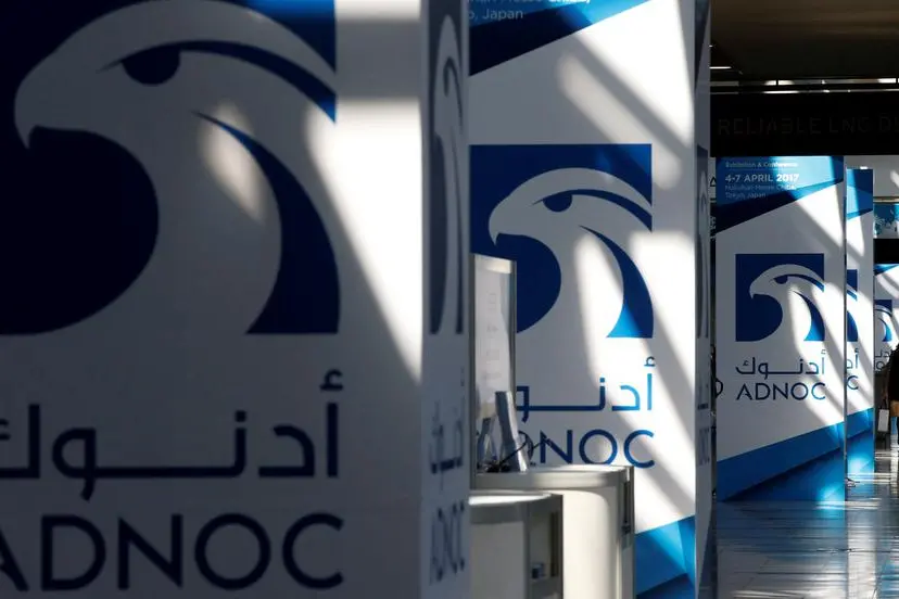 FILE PHOTO: Logos of ADNOC are seen at Gastech, the world\\'s biggest expo for the gas industry, in Chiba, Japan, April 4, 2017. REUTERS/Toru Hanai/File Photo , Reuters/REUTERS