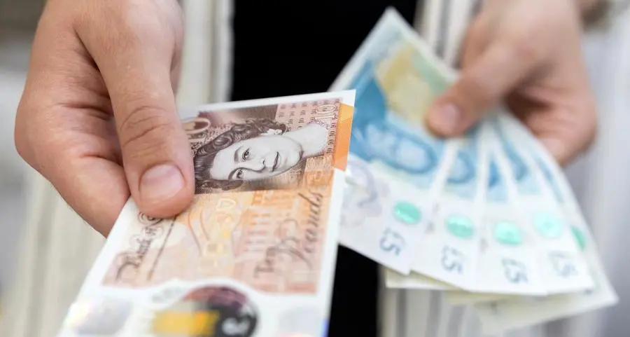 Pound dips from 18-week high before Bank of England decision