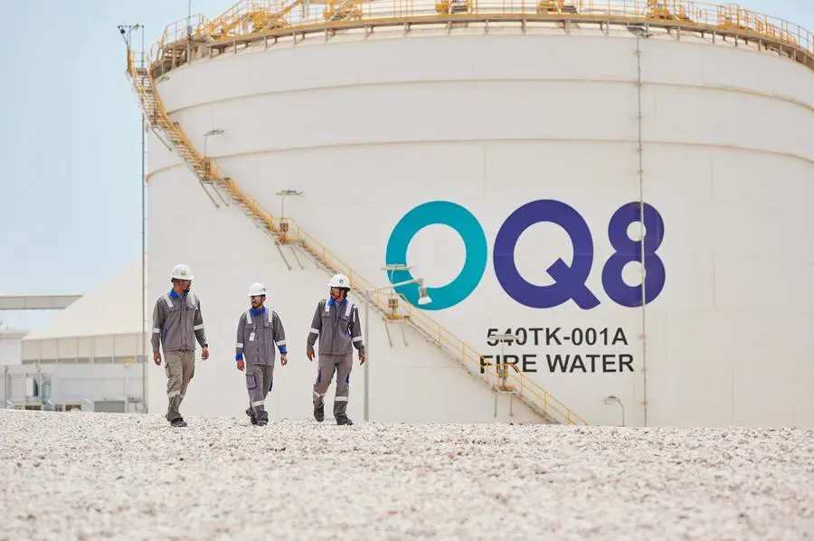Workers at OQ8 refinery. Image courtesy: OQ8