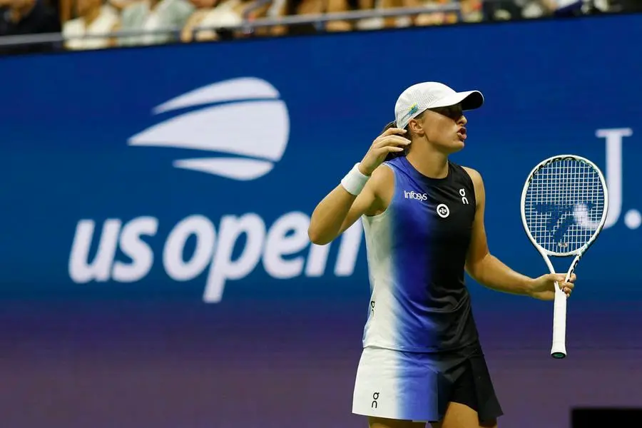 Sep 3, 2023; Flushing, NY, USA; Iga Swiatek of Poland reacts after missing a shot against Jelena Ostapenko of Latvia (not pictured) on day seven of the 2023 U.S. Open tennis tournament at USTA Billie Jean King National Tennis Center. Mandatory Credit: Geoff Burke-USA TODAY Sports