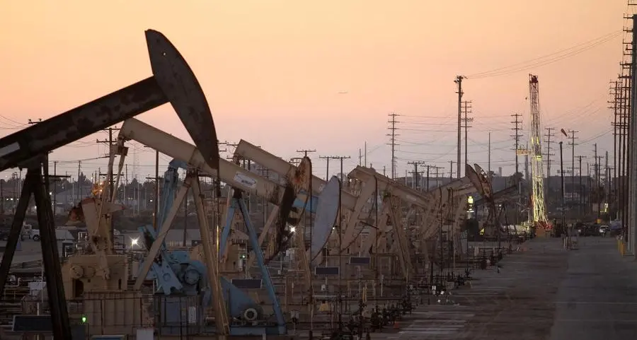 Oil slips even as US winter storm curbs crude output