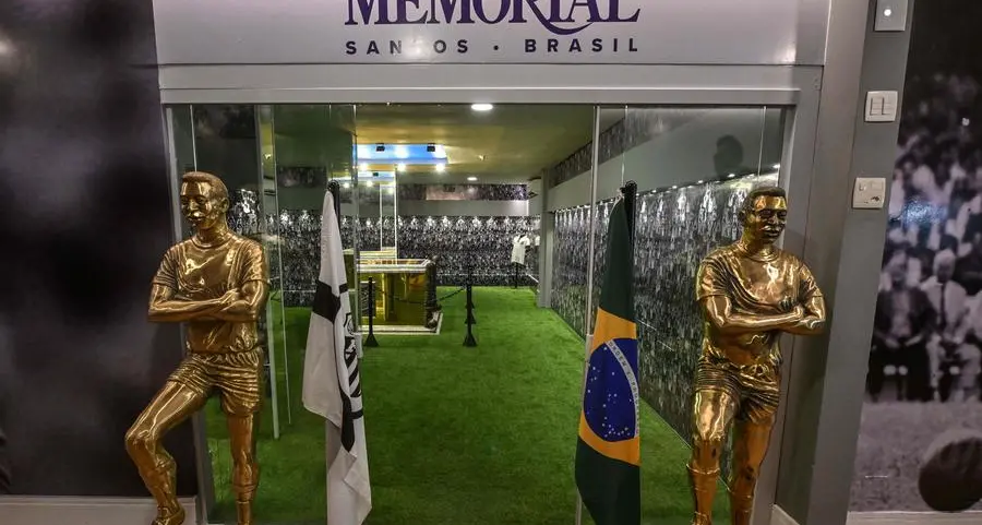 Pele's gilded, turf-lined tomb opens to public in Brazil